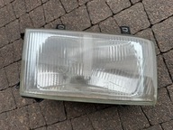 REFLEKTOR ORYGINAŁ HELLA PRAWY VW T4 TRANSPORTER 1991-2003 SILNICZEK RAMKA