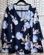 UROCZA DOŁEM ROZKLOSZOWANA W GRANACIE W PASTELOWE KWIATY ok 50