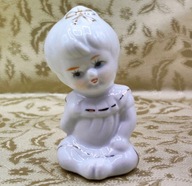 Śliczna porcelanowa siedząca dziewczynka 1z4, D
