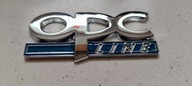 Metalowe logo OPC Line firmy Opel. Nowiutkie, z dociętą taśmą klejącą.