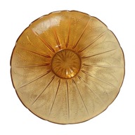 Miska ze szkła prasowanego w kolorze miodowym.