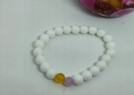 Bransoletka z białymi koralikami/na gumce;koraliki żółte-fioletowe