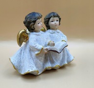 2 obejmujące się i śpiewające aniołki STARA figuka