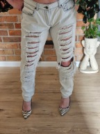 Gina Tricot jeans skinny przecierane dziury spodnie jeansy r. 40/42 (32)