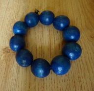 Bransoletka damska , drewniane korale na gumce