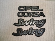ZNACZEK EMBLEMAT LOGO NAPIS GM CZARNY OPEL CORSA B SWING 90481557 KOMPLET