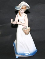 PORCELANOWA FIGURKA KOBIETA Z KOSZEM KWIATÓW ARPO ROMANIA 24,5 cm.