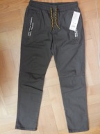 Grafitowe spodnie materiałowe 146