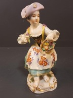Miśnia (Meissen) – Figurka Dziewczynka z koszykiem kwiatów”Sygnatura miecze