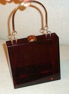 Damska torebka z brązowego plastyku .