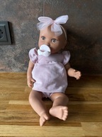 LullaBaby: Lalka NIEMOWLĘ ze smoczkiem, w sukience i opasce 7312
