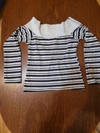 Elegancka bluzka w czarno-białe pasy z karczkiem z suwakami