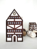 Podpórka do książek. Szachulcowa kamieniczka z zegarem.