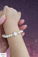 Bra0082 Bransoletka dziecięca na gumeczce koralik biały kwiatek