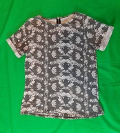 Wygodna, biało-czarna, wzorzysta bluzka z Pepco