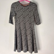 Elastyczna sukienka rękaw 3/4 rozkloszowana Palomino 122 przy ciele (100)