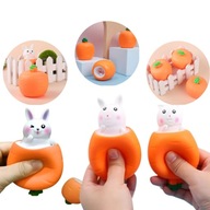 GNIOTEK KRÓLICZEK W MARCHEWCE SENSORYCZNY ANTYSTRESOWY SQUISHY WYSKAKUJĄCY