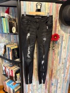 Takko fashion jeansowe elastyczne jeansy z dziurami M