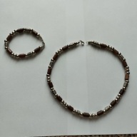 Komplet naszyjnik i bransoletka brązowa z srebrnymi okuciami