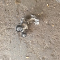 RENAULT CLIO IV WSPORNIK ŁAPA ALTERNATORA 117108063R