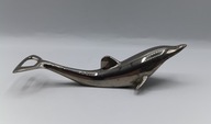 Otwieracz do butelek z lat 60 XX w. metalowy Delfin vintage kolekcjonerski