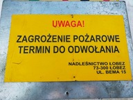 tablica informacyjna malowana ostrzegawcza