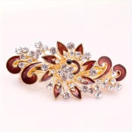 SPINKA klamra złote cyrkonie brązowa magia vintage modne retro perła wiosna