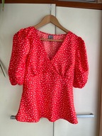 36 asos satynowa pomarańczowa bluzka białe groszki