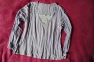 Bluzka z fantazyjnym dekoltem koronka cekiny 40/42