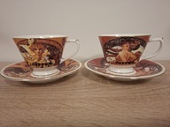 2 porcelanowe filiżanki z podstawkami z grafiką a'la Klimt