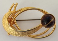 Broszka grubo złocona kamień kocie oko wym. 40x24 mm śr. oczka 10 mm