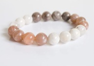 Naturalny KAMIEŃ SŁONECZNY kulka gładka 10mm odcienie bransoletka