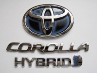 TOYOTA COROLLA E21 SEDAN EMBLEMAT ZNACZEK NAPIS LOGO KLAPY TYŁ HYBRID KPL.