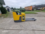 Wózek elektryczny paletowy z podestem Jungheinrich ERE225 używana bateria