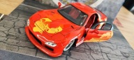 Jada Mazda RX-7 Orange JLS Fast & Furious 1:24 Otwierane Elementy