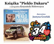 Książka ”Piekło Dakaru” z autografem Krzysztofa Hołowczyca.