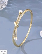 Bra0062 Bransoletka złocona sztywna kokardka perełka żółte złoto