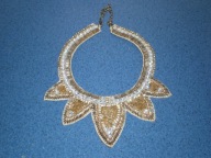 CIEKAWY NASZYJNIK ZŁOTO CEKINY BŁYSK