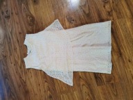 Biała koronkowa sukienka z falbanką