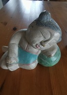 Chińska stara figurka śpiącego dziecka na arbuzie