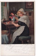Kobieta układa kwiaty goździki w wazonie 1918r. R. Wimmer