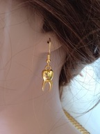 Kolczyki zęby złote duże