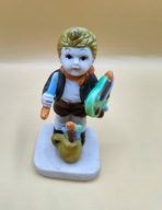 Przyszły malarz mały chłopiec z paletą i pędzlem