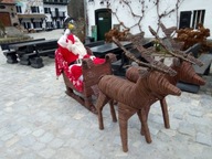 Wiklinowy renifer z saniami