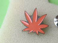 Oryg Odznaka- POMARAŃCZOWY SYMBOL LIŚCIA KONOPI