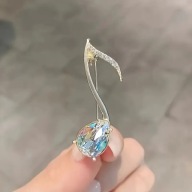 BROSZKA PRZYPINKA NUTKA KLUCZ WIOLINOWY kobieta AGRAFKA ŁEZKA CYRKONIA