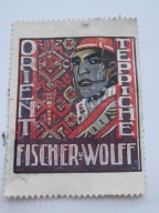 Fischer i Wolff - dywany - zalepka reklamowa