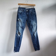 Spodnie jeansy z dziurami ONLY 29/32 (rozm. 36) damskie przecierane (509)