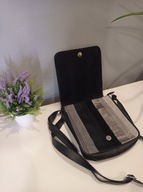 Torba na ramię typu listonoszka. Wygodna i pojemna