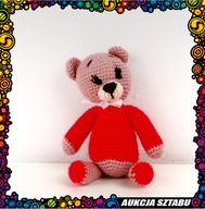 Pluszowy miś w czerwonym sweterku